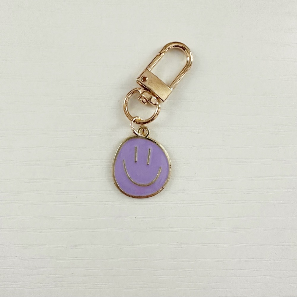 NEW Purple Smiley Face Keychain